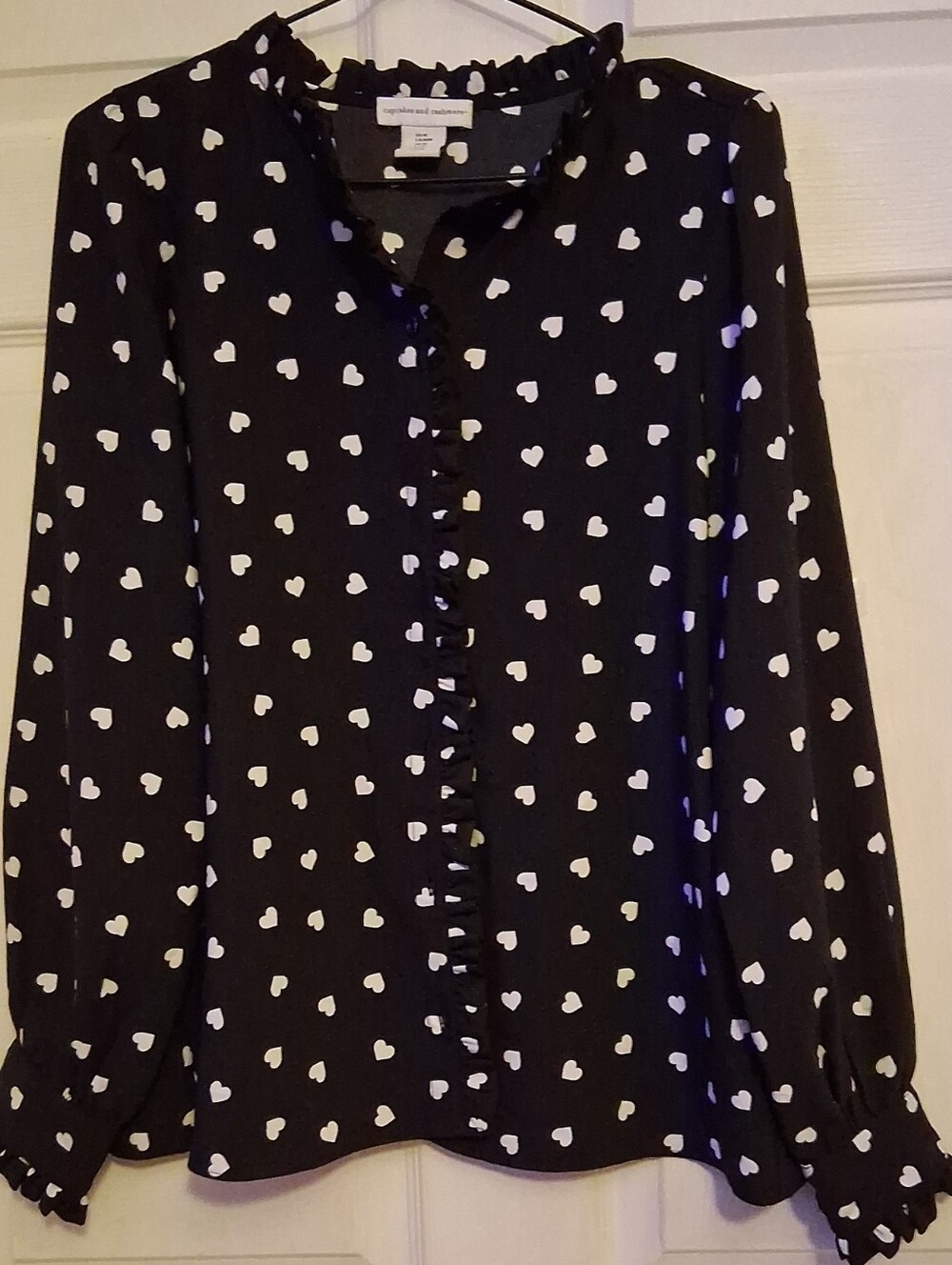 Cupcake And Cashmere Black Heart Print Ruffle Front Blouse
